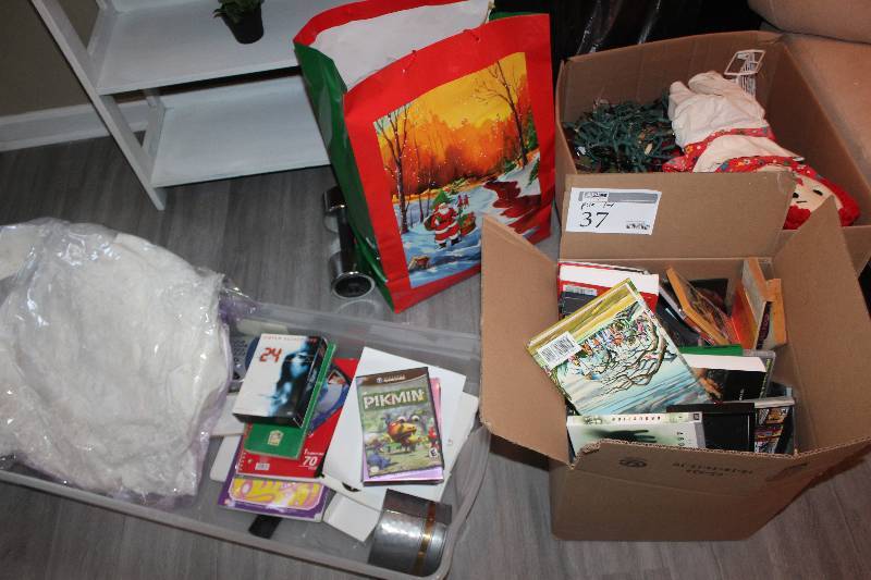 lot 37 image: Pile Lot Including Games, Books, Decorations