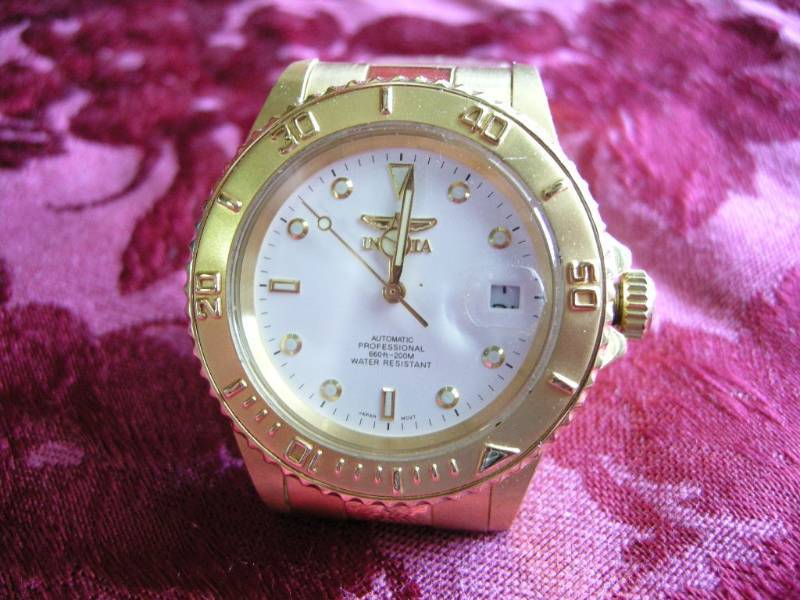 lot 4 image: Faux Invicta Perpetual Motion Mens Watch