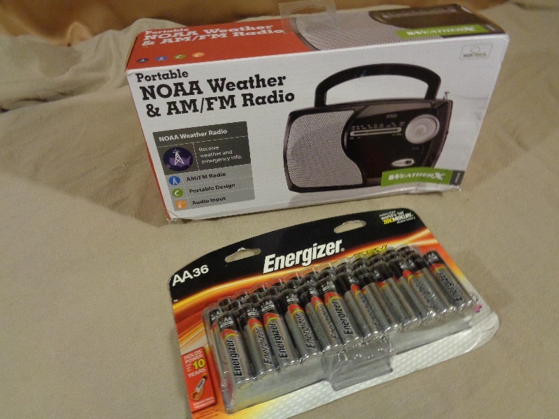 lot 93 image: New NOAA Weather Radio and 36 AA Batteries