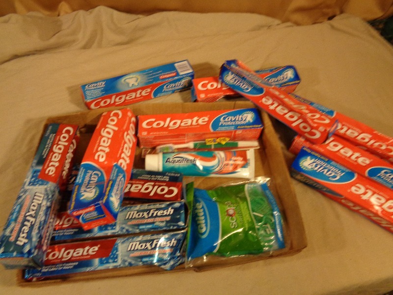 lot 115 image: New Toothpaste, Floss, and Toothbrush
