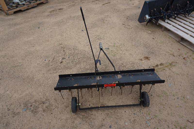 lot 141 image: Brinly Brand 40 Pull Behind Garden Tractor Lawn Dethatcher Aerater