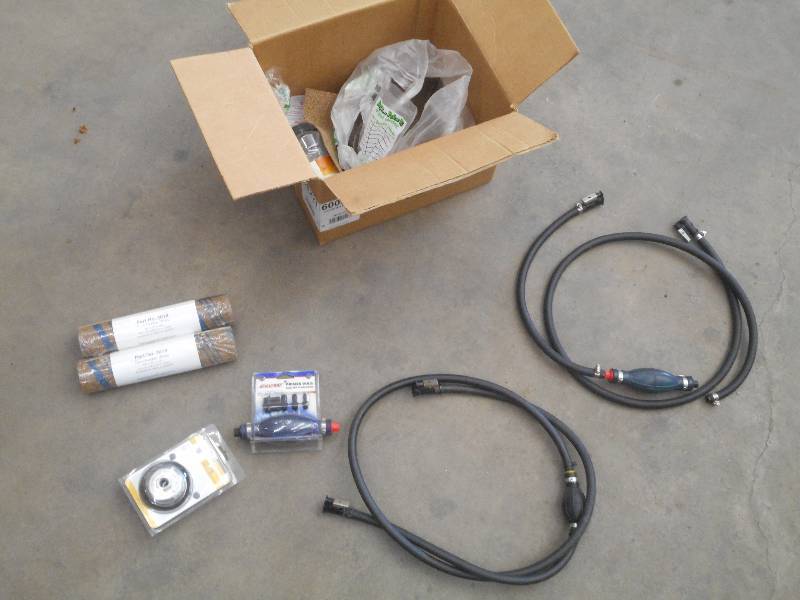 lot 58 image: Box Of Boat Motor Fuel Lines, Cork-...