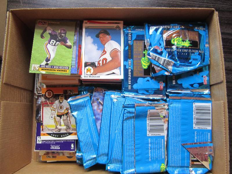 lot 210 image: Box of assorted sports cards...