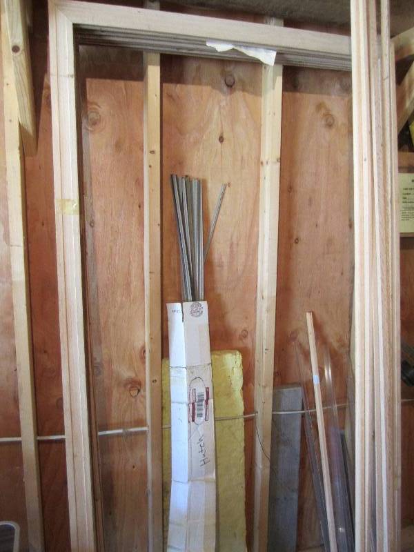 lot 48 image: Lot of wood trim and weatherstripping...