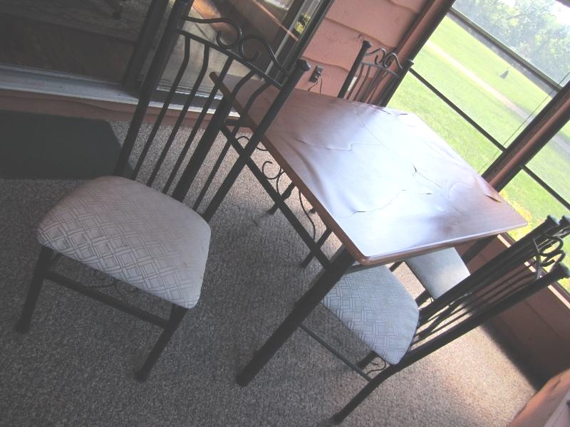 lot 71 image: Table and 4 metal frame upholstered...