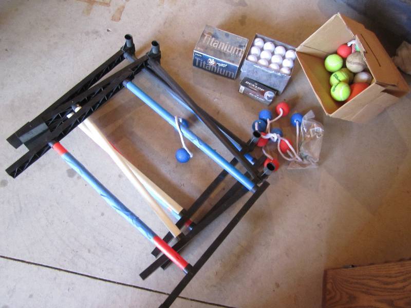 lot 108 image: New golf balls, ladder ball game  and balls for other ...
