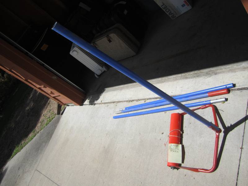 lot 115 image: Roof snow rake...