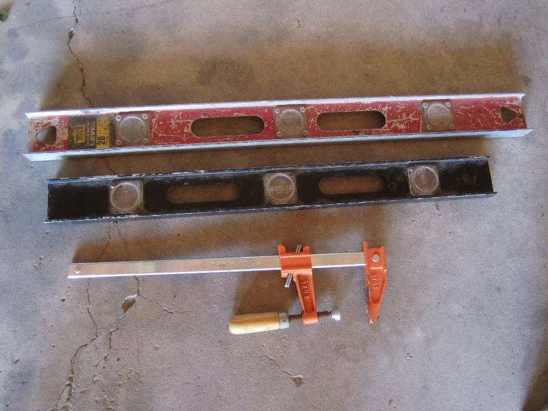 lot 132 image: Levels and clamp...