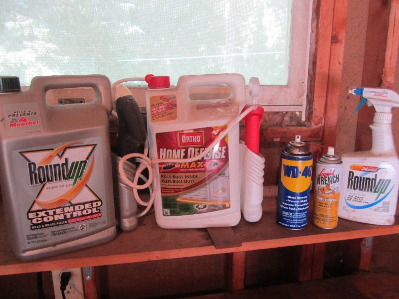 lot 153 image: Lot of yard chemicals and lubricant...