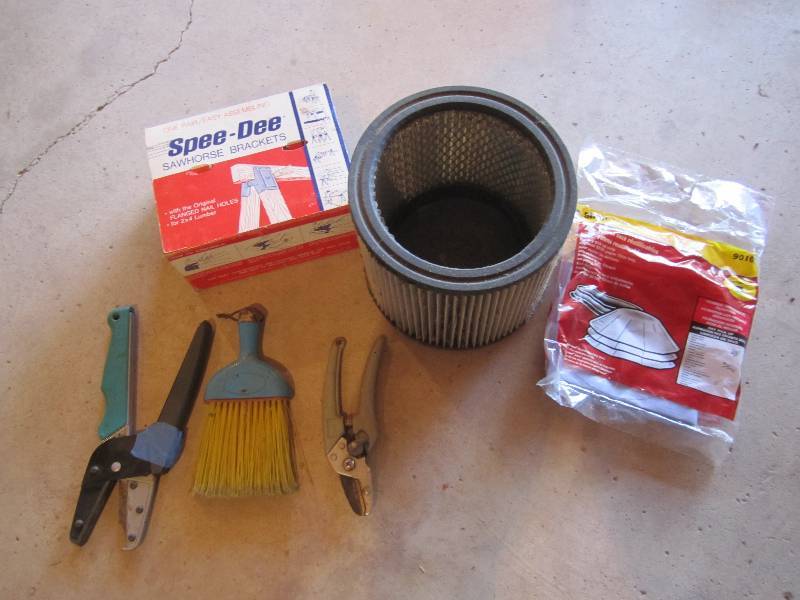 lot 166 image: Sawhorse legs, shop vac filters...