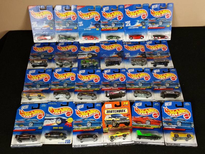 lot 90 image: 24 Unopened 1990s  2000s Hotwheels in the Original Packaging