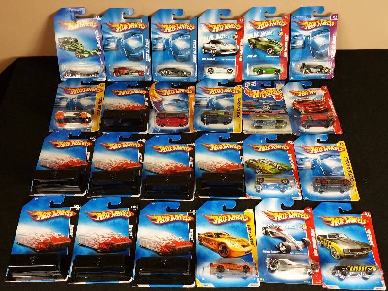 lot 97 image: 24 Unopened 1990s  2000s Hotwheels in the Original Packaging