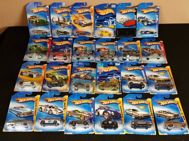 lot 99 image: 24 Unopened 1990s  2000s Hotwheels in the Original Packaging