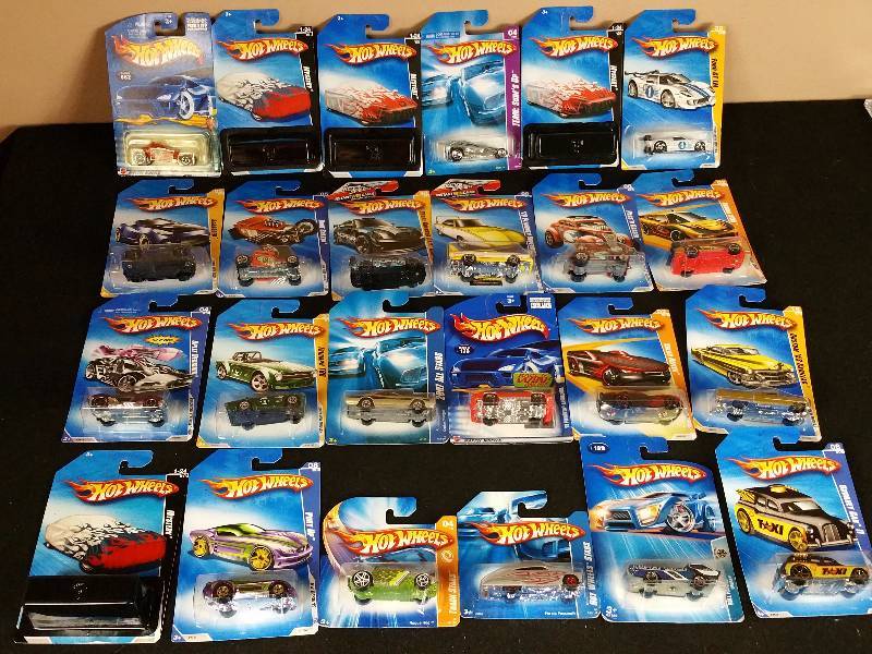 lot 100 image: 24 Unopened 1990s  2000s Hotwheels in the Original Packaging