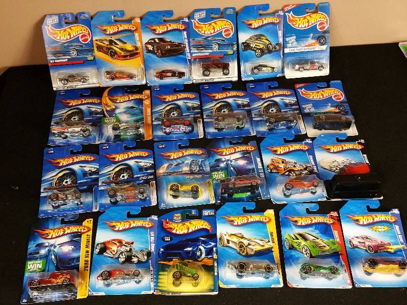 lot 101 image: 24 Unopened 1990s  2000s Hotwheels in the Original Packaging