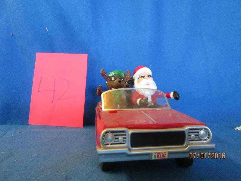 classic car with santa and raindeer...