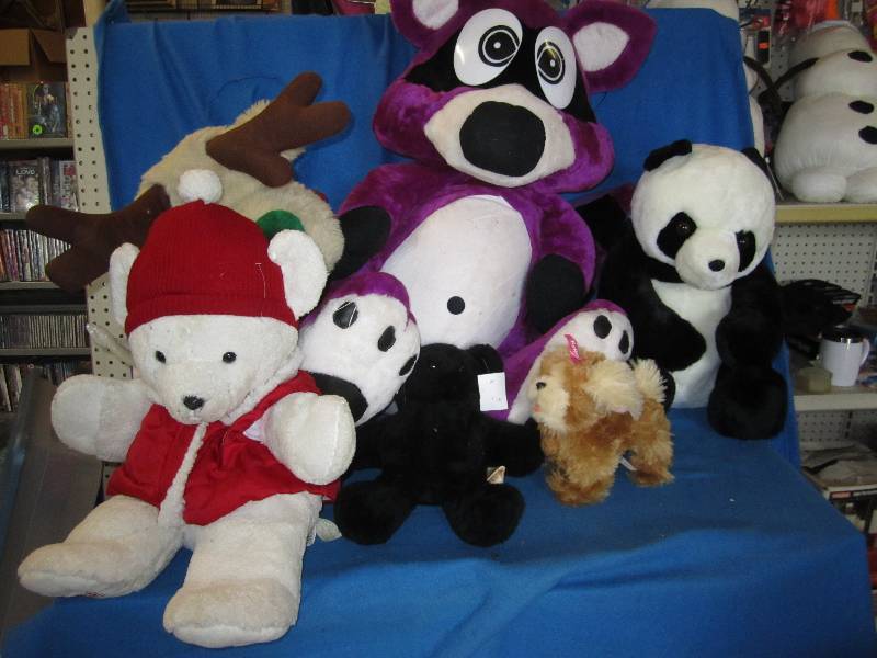 Lot of stuffed animals including so...