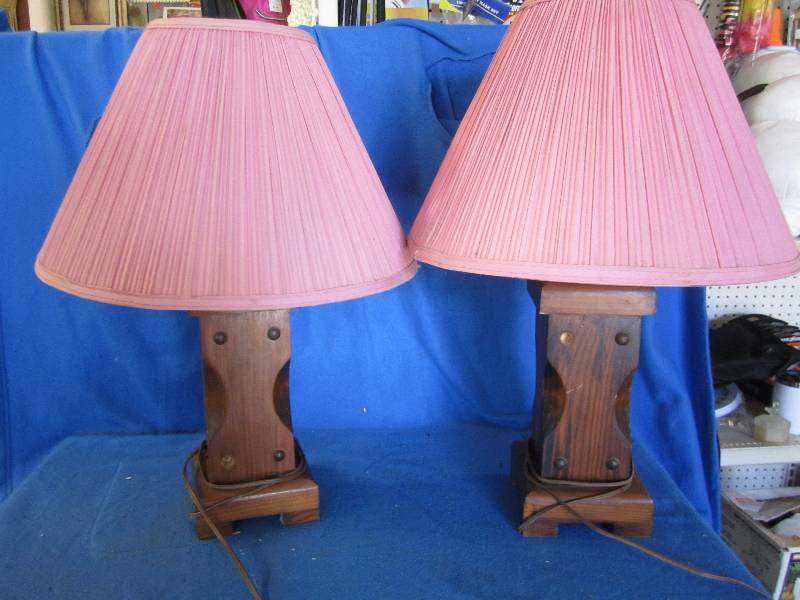 2 wood base lamps with pink shades...