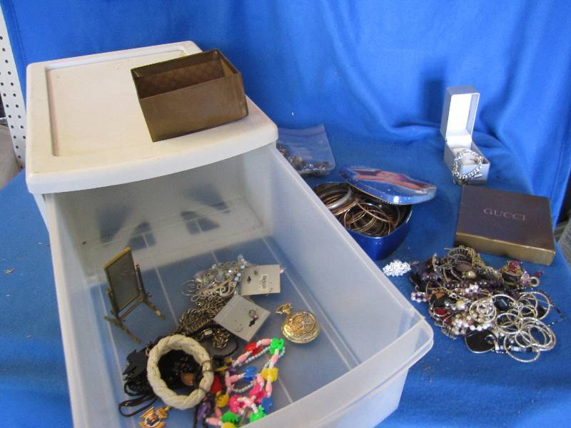 Sterilite drawer filled with costum...