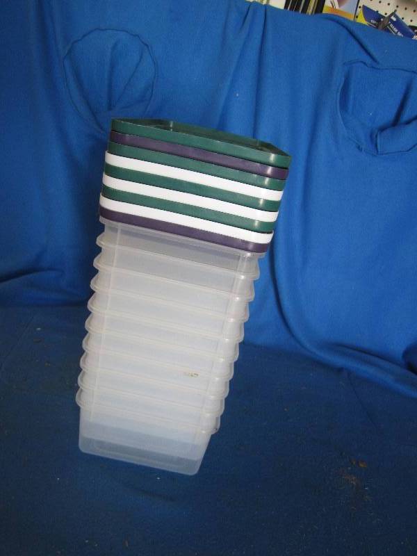 Lot of plastic storage boxes size o...