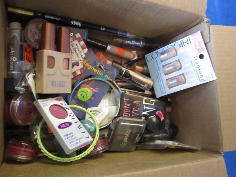 lot of cosmetics eyeshadow eyeliner...