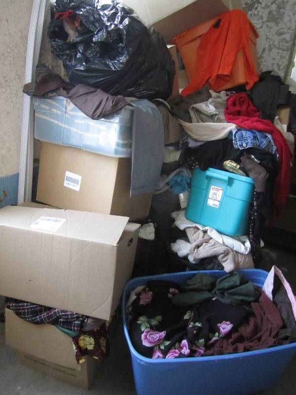 Many boxes of used clothing, variou...