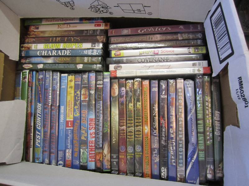 Lot of new shrink wrapped DVDs...