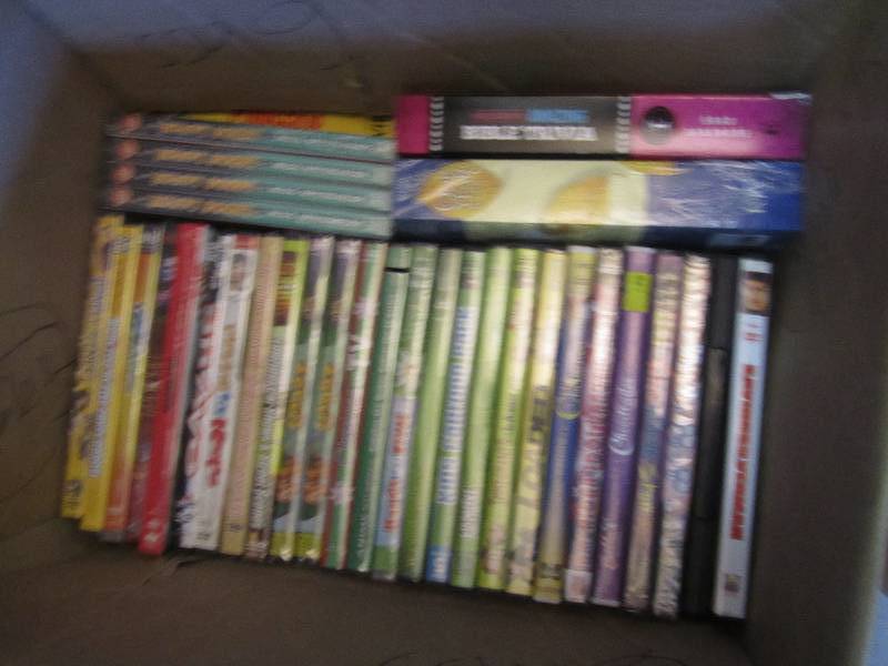 Lot of new shrink wrapped DVDs...
