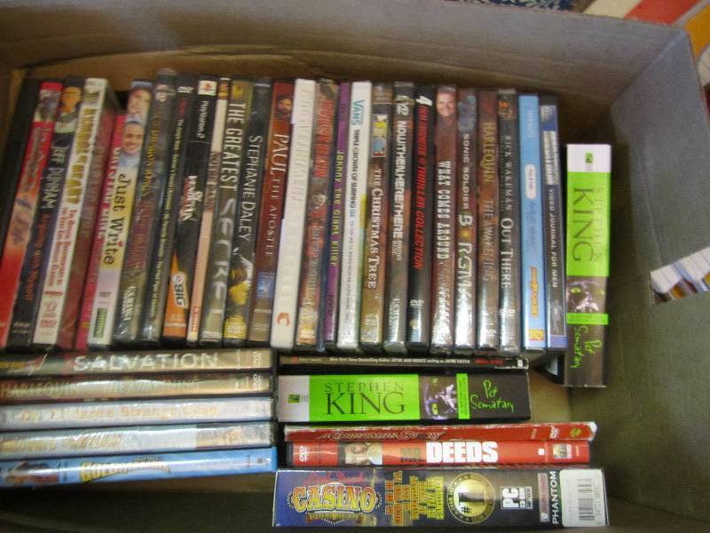 Lot of new shrink wrapped DVDs...