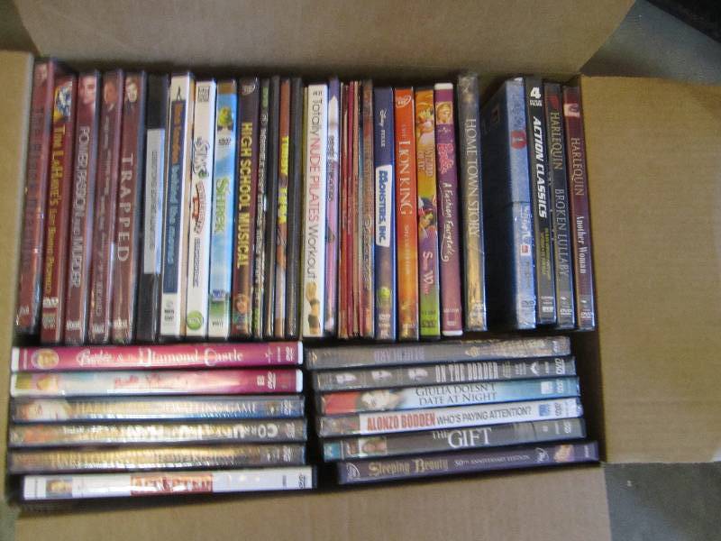 Lot of new shrink wrapped DVDs...