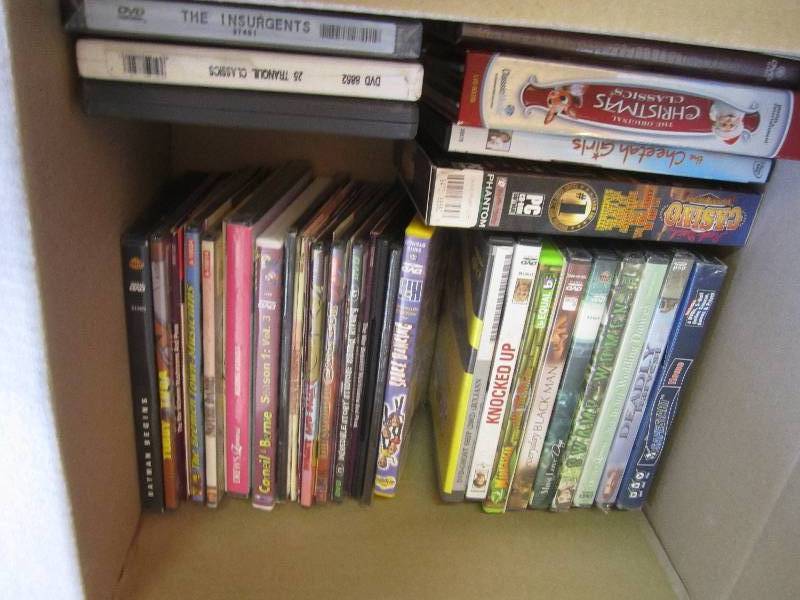Lot of new shrink wrapped DVDs...