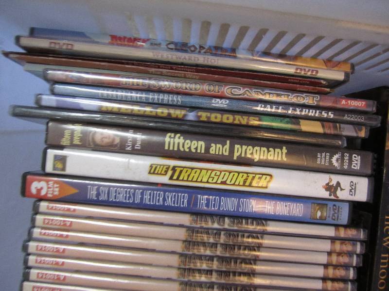 Lot of new shrink wrapped DVDs...