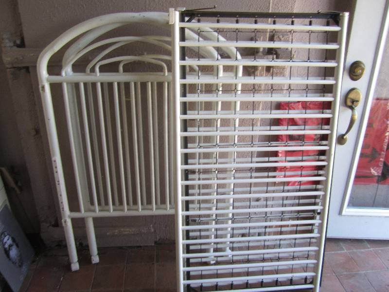 Metal frame crib by Cosco 50 tall...