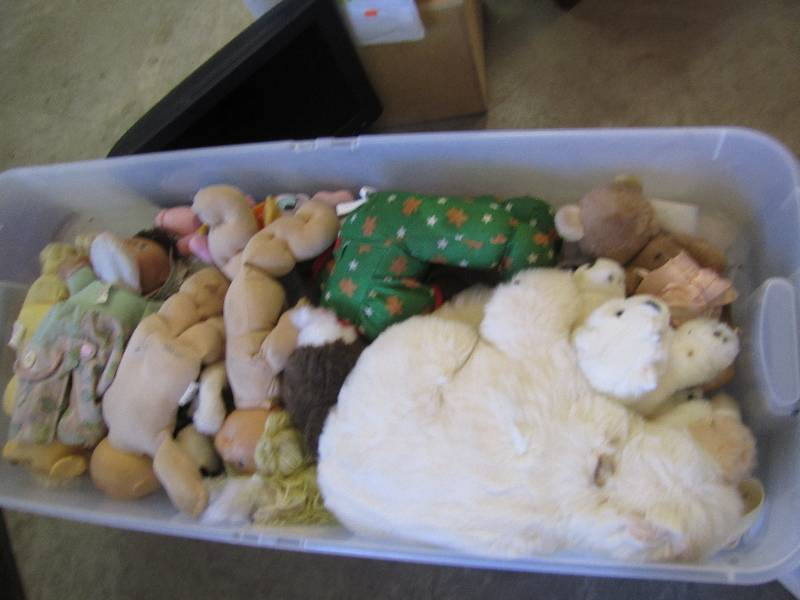 Under the bed storage bin of dolls ...
