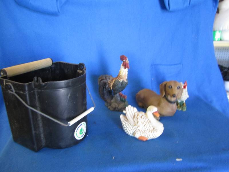 Figurines and bucket...