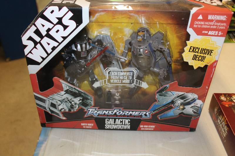 lot 9 image: Star Wars Transformers Galactic Showdown Action Figure Darth Vader Tie Fighter & Obi-Wan Kenobi Jedi Starfighter