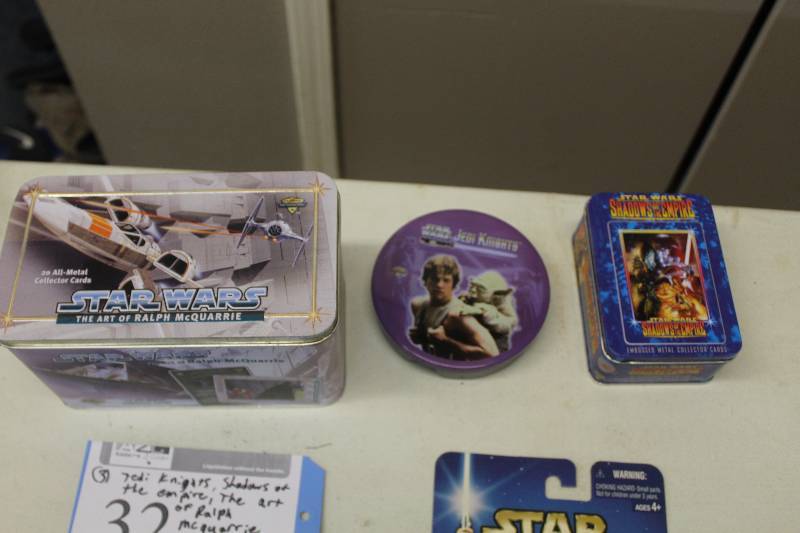 lot 32 image: Lot of (3) Star Wars Collectibles Including 1) The Art Of Ralph McQuarrie 20 All-Metal Collector Cards #0486712000 AND 1) Jedi Knights Collector Cards AND 1) Shadows Of The Empire Embossed Metal Collector Cards