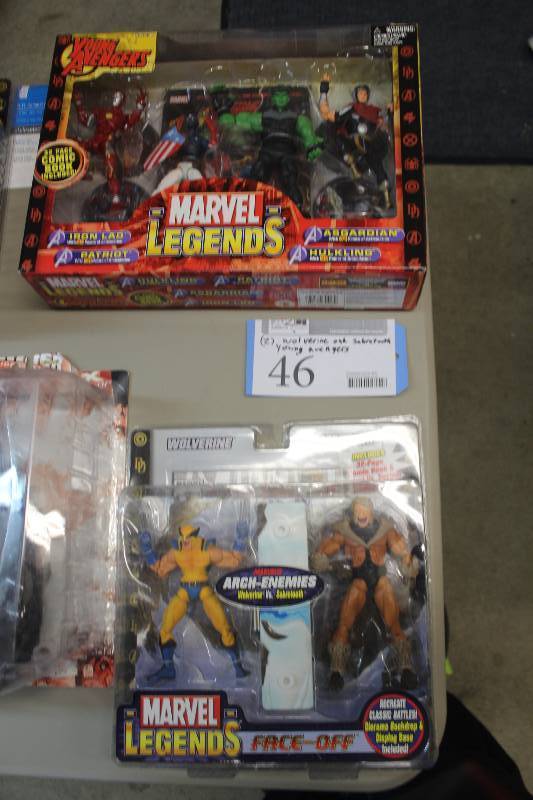 lot 46 image: Lot of (2) Marvel Young Avengers Action Figures Including 1) Iron LadPatriotAsgardianHulkling AND 1) Arch Enemies Wolverine vs. Sabertooth