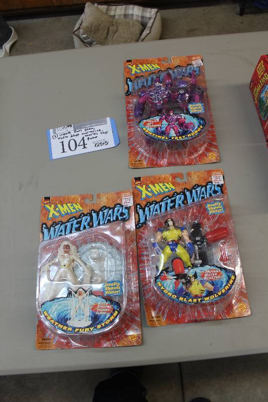 lot 104 image: Lot of (3) Marvel Comics X-Men Water Wars Action Figures Including 1) Sentinel Test Robot AND 1) Hydro Blast Wolverine AND 1) Weather Fury Storm