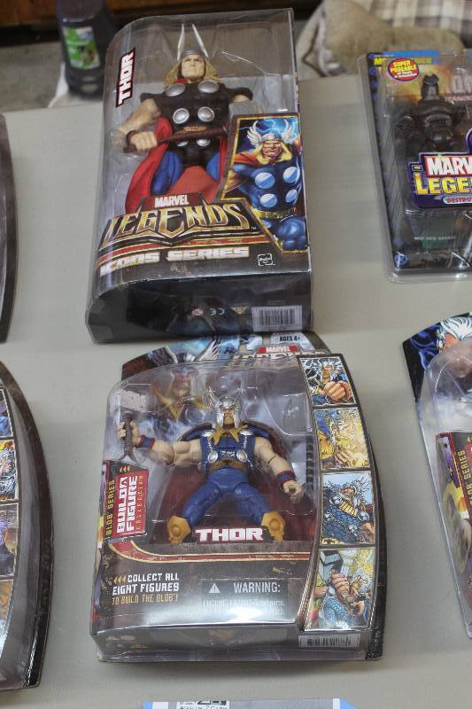 lot 127 image: Lot of (2) Marvel Action Figures Including 1) Icon Series Thor AND 1) Legends Build A Figure Collection Thor