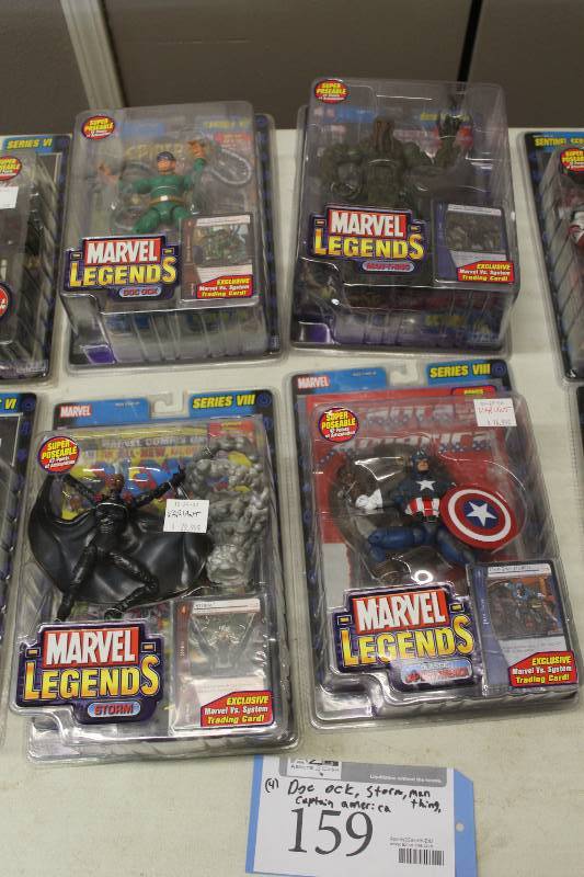 lot 159 image: Lot of (4) Marvel Legends Series VIII Action Figures Including 1) Doc Ock AND 1) Storm AND 1) Thing AND 1) Captain America