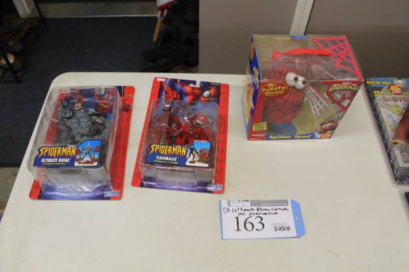 lot 163 image: Lot of (3) Marvel Spiderman Action Figures Including 1) Ultimate Rhino AND 1) Carnage AND 1) Mr. Potato Head Spider Spud