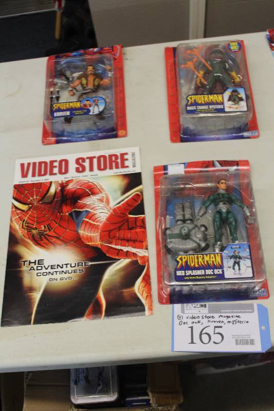 lot 165 image: Lot of (4) Spiderman Collectibles Including 1) Video Store Magazine AND 1) Action Figure Web Splasher Doc Ock AND 1) Action Figure Magic Change Mysterio AND 1) Action Figure Kraven