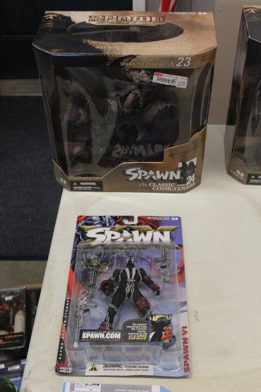 lot 180 image: Lot of (2) Spawn Action Figures Including 1) Spawn VI AND 1) Spawn The Dark Ages