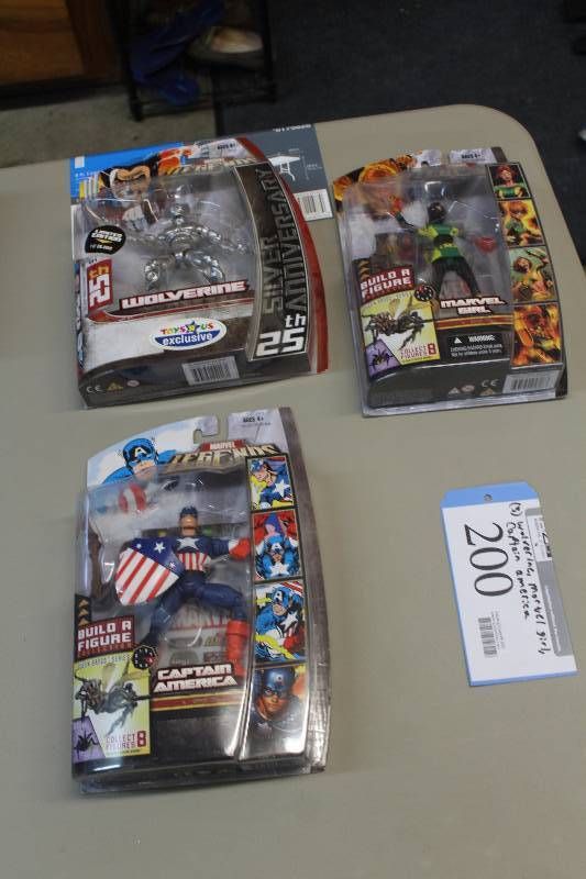 lot 200 image: Lot of (3) Marvel Action Figures Including 1) Legends Build A Figure Collection Marvel Girl AND 1) Legends Build A Figure Collection Captain America AND 1) 25th Anniversary Wolverine