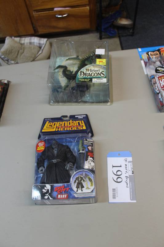 lot 199 image: Lot of (2) Action Figures Including 1) Dragons Series 2 AND 1) Legendary Comic Book Series Moneyman Series Sin Cit Marv