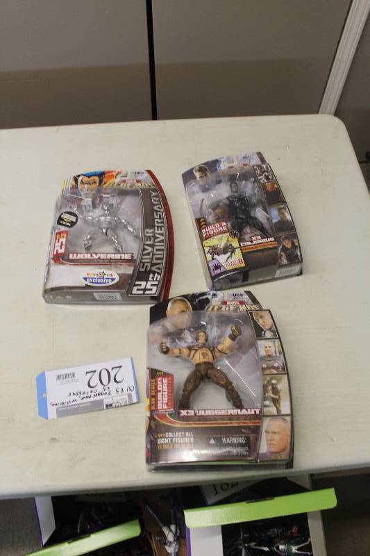 lot 202 image: Lot of (3) Marvel Action Figures Including 1) Legends Build A Figure Collection X3 Juggernaut AND 1) Legends Build A Figure Collection X3 Colossus AND 1) 25th Anniversary Wolverine