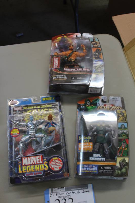 lot 232 image: Lot of (3) Marvel Legends Action Figures Including 1) Annihilus Series Hercules AND 1) Series V Silver Surfer AND 1) Fantastic Four Dr. Doom