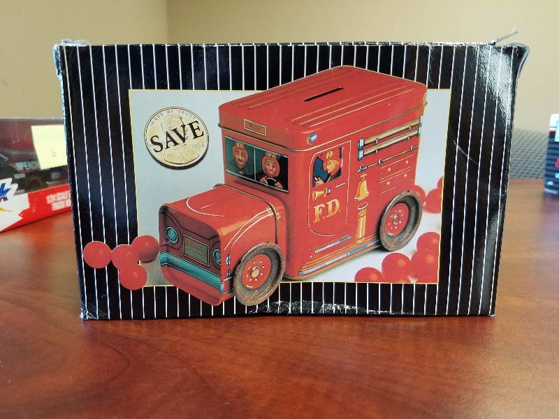 lot 7 image: Fire Truck Tin Bank