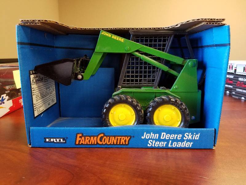lot 8 image: John Deere Skid Steer Loader by ERTL